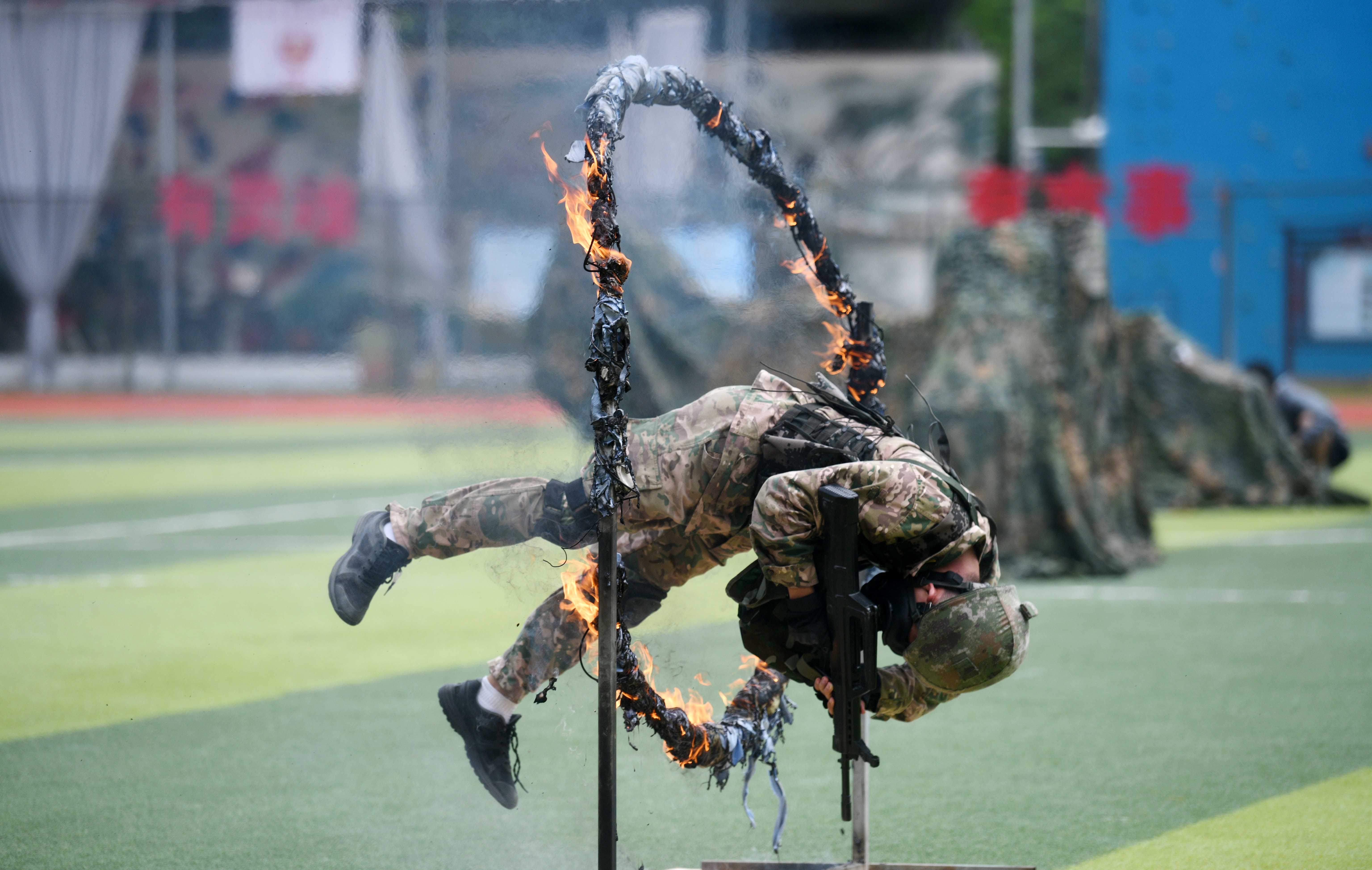邱伟荣-广州举办2023“国防教育进校园”暨“国-FZ100210794767