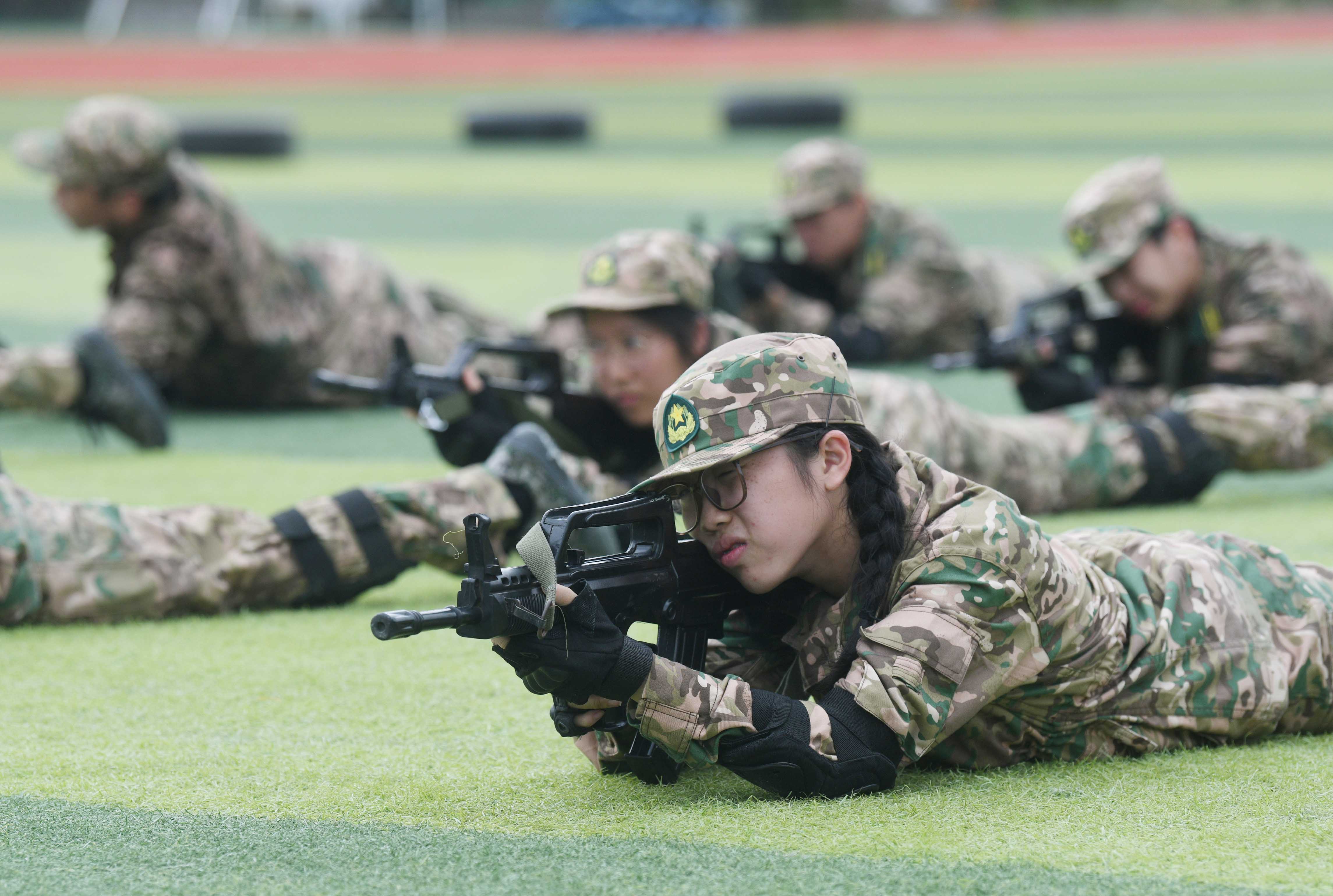 邱伟荣-广州举办2023“国防教育进校园”暨“国-FZ100210794773
